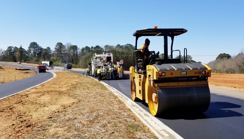 county vehicle equipment working on troup county roads